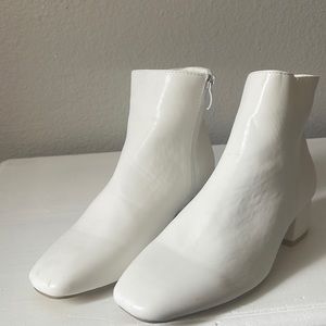 White cute boots they are super comfortable it just that they fit me big and